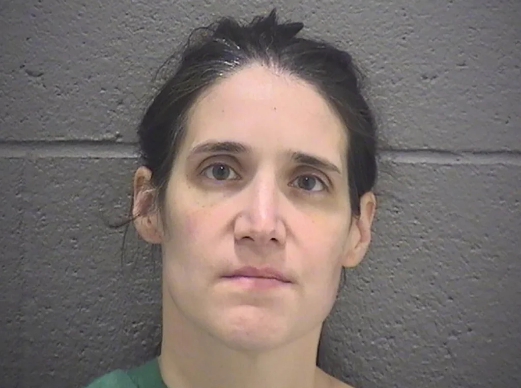 Booking photo of Andrea Faust, the Durham mother charged with first-degree murder and attempted murder in the deaths and injuries of her two young children.