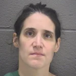 Booking photo of Andrea Faust, the Durham mother charged with first-degree murder and attempted murder in the deaths and injuries of her two young children.